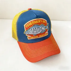 Vintage mesh baseball cap, breathable trucker cap with embroidered badge for outdoor sun.