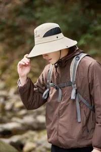 Outdoor sun hat for men, wide brim bucket hat with breathable mesh for hiking and camping.