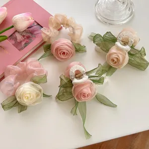 Romantic organza rose floral hair scrunchies and large hair claws in cream and pink
