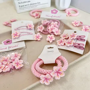 Sweet pink cherry blossom flower hair ties and hair clips set for daily hair styling