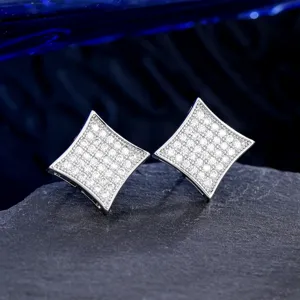 Macro detail of diamond-shaped stud earrings with full micro-pave cubic zirconia