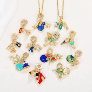 Collection of colorful travel-themed enamel charms including airplane and passport.