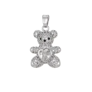 Detailed macro view of silver heart bear pendant with micro-pave sparkling cubic zirconia
