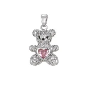 Detailed view of silver teddy bear pendant with micro-pave stones and pink heart