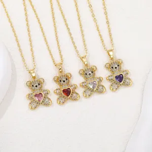 Detailed view of micro-paved zircon teddy bear necklaces with colorful heart stones