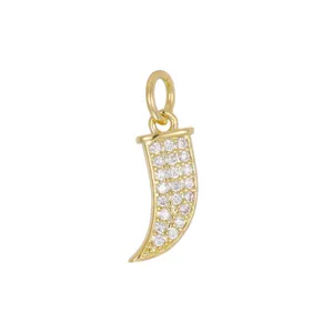 Close-up of 18K gold plated horn pendant with cubic zirconia inlay for DIY jewelry