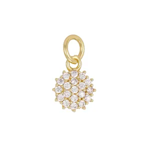 Close-up of 18K gold-plated mini charm pendant with sparkling zirconia inlay