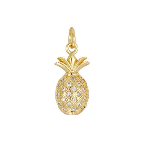 Detail view of miniature 18K gold-plated pineapple pendant with sparkling zirconia