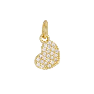 Detailed macro view of the gold-plated heart charm featuring pavé set cubic zirconia