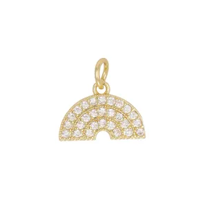 Detailed view of a mini 18K gold plated rainbow pendant with sparkling cubic zirconia stones.