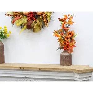 Autumn Thanksgiving floral arrangement and wreath home decor display on mantel