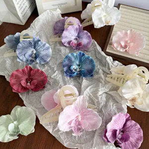 Large pleated orchid flower hair claw clip for thick hair in assorted vacation colors
