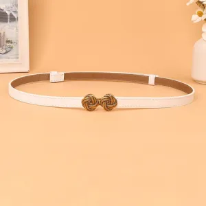 Women's white thin belt detail view showing the vintage metallic knot buckle and clean leather finish.