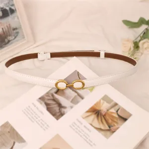 Elegant women's thin white belt with stylish metal buckle, perfect for dresses and jeans.
