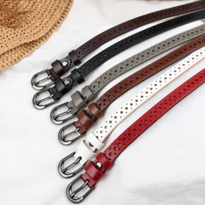 Detail of women thin leather belts featuring elegant hollow diamond patterns in multiple colors.