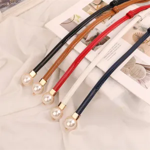 Elegant thin women's waist belt with large pearl buckle for dress and shirt decoration