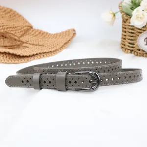 Detail shot of women grey hollow leather belt with metal buckle, casual fashion accessory.