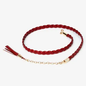 Red braided leather waist belt with gold chain detail and tassel, perfect for dresses and coats.