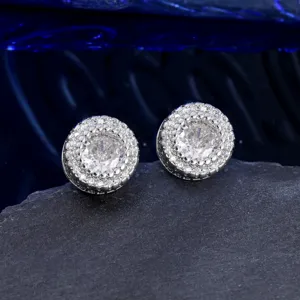 Detailed close-up view of micro-pave iced out stud earrings with brilliant zircons