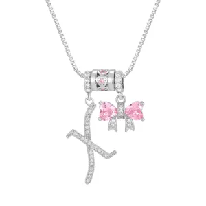 Elegante Silberhalskette mit Buchstabe K und rosa Herzschleife mit Zirkonia-Steinen