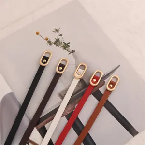Minimalist women thin leather belt detail showing five vibrant colors with elegant gold oval buckles.