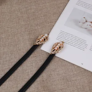 Elegant women thin belt with gold pearl leaf metal buckle, chic black dress waist belt.