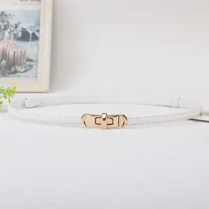 Slim white leather belt with gold metal lock buckle for dresses and casual wear details.