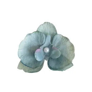 Elegant teal orchid flower hair clip with pearl center for women's fairy styling