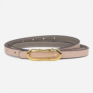 Cinturón fino reversible de cuero auténtico para mujer con hebilla ovalada dorada elegante.