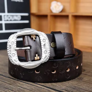 Retro brown wide belt with ornate silver pin buckle and vintage anchor debossed pattern style.