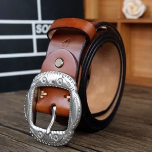 Retro brown leather belt with ornate silver metal buckle, vintage casual wide belt style.