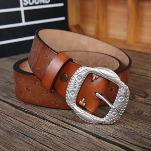 Retro brown wide leather belt with vintage silver pin buckle and embossed marine pattern details.