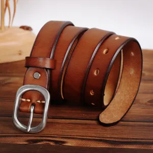 Detailed view of the genuine leather belt roll, highlighting premium texture and metal buckle.