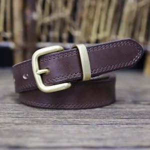 Detailed view of brown genuine leather belt with metallic buckle, retro style stitchwork texture.