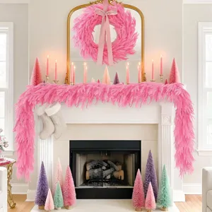 Detailed view of pink Norfolk pine garland and wreath decor on a festive fireplace mantel.