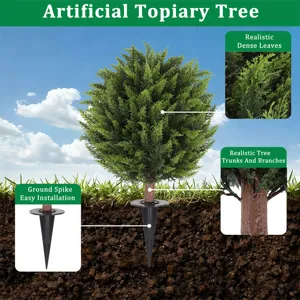 Detailed features of artificial topiary tree including realistic dense leaves and ground spike
