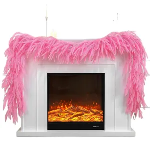 Vibrant pink Norfolk pine garland draped over a white fireplace mantel for home decor