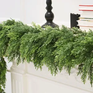 Detailed macro view of the realistic soft rubber foliage on a Norfolk pine garland.