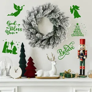 Detail view of flocked Christmas wreath and green festive wall stickers on a mantel