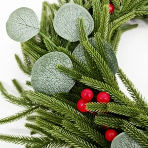 Close-up of realistic pine needles, eucalyptus leaves and red berries for Christmas wreath