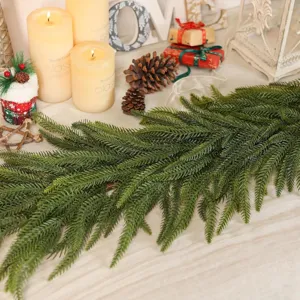 Detailed macro view of artificial Norfolk pine needles with realistic PE texture.