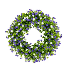 Artificial eucalyptus wreath with purple and white gypsophila flowers for door decoration