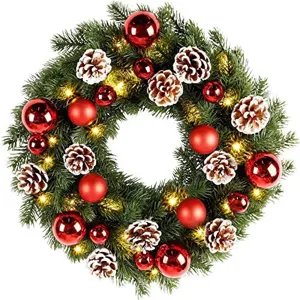 Pre-lit Christmas wreath with warm LED lights, red ornaments and snow pine cones