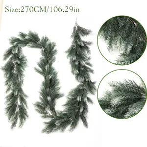 Detailed view of a 270cm frosted artificial pine needle Christmas garland for home decoration
