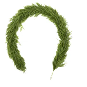 Detailed view of realistic green Norfolk pine garland for Christmas staircase decor