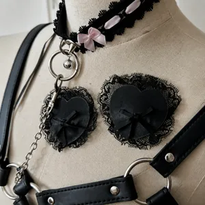 Gothic black lace heart pasties set with cute pink bow choker and body chain harness.