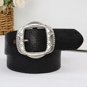 Details of black vintage leather women belt with ornate silver buckle for jeans streetwear style.