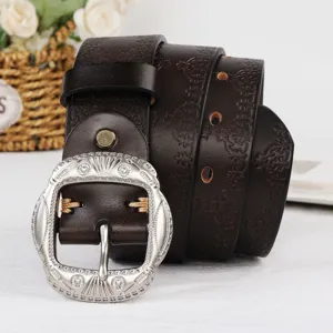 Vintage dark brown embossed leather belt with ornate silver metal buckle for stylish women daily.