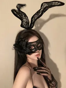 Black lace bunny ears headband and eye mask set, sexy costume cosplay party accessories detail.