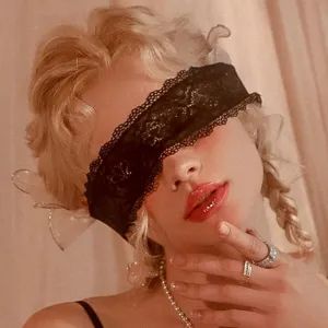 Sexy black lace blindfold for women, sheer embroidered hollow design with adjustable strap.